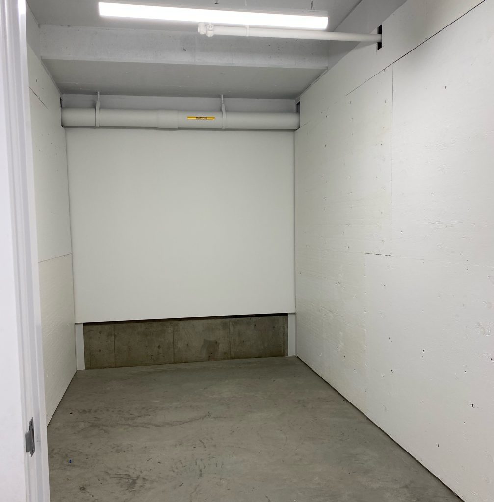 inside of storage unit in 352 urban centre angled to the right. Storage unit is empty.