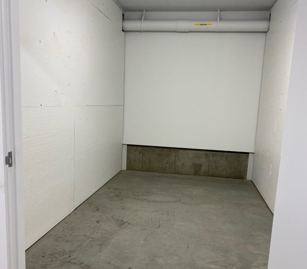 another photo inside of storage unit in 352 urban centre just angled to the left. Storage unit is empty.